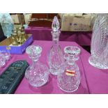 Three cut glass decanters