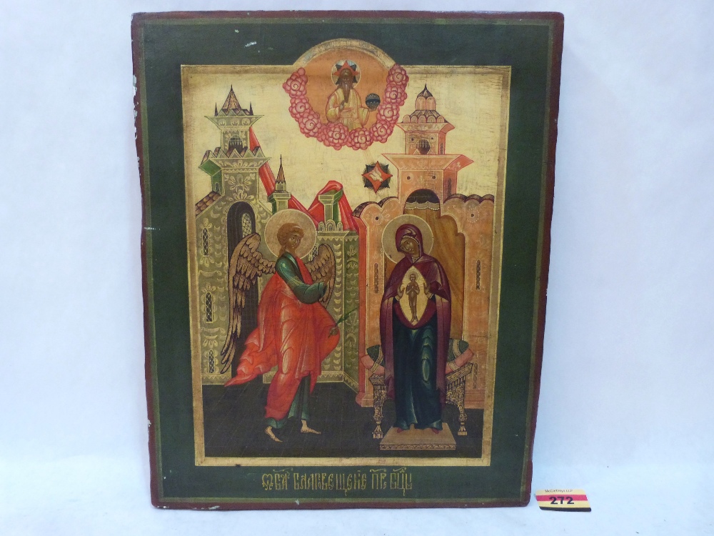 `A Russian iconographical painting of The Annunciation. Oils and gilding on wood panel. 14' x 11¼'