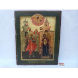 `A Russian iconographical painting of The Annunciation. Oils and gilding on wood panel. 14' x 11¼'