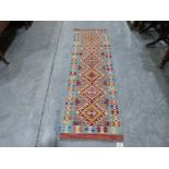 A Choli Kilim runner. 1.87m x 0.59m