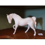 A Beswick horse, matt white glazed. 7¼' high