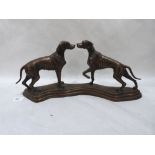 A bronze group of two hounds. 19' wide