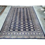A blue ground rug. 106' x 73'