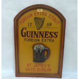 A Guinness Foreign Extra wall plaque