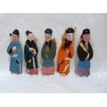 Nine Chinese textile and card figures. 10' high approx.