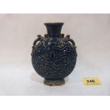 A Chinese blue glazed earthenware flask, the shoulders with two lugs, decorated with birds and