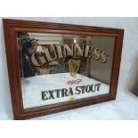 A Guinness Extra Stout advertising pub mirror. 15' x 21'