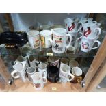 A collection of Guinness ceramics to include water jugs, mugs and ashtrays