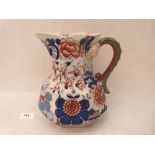 A Mason's Ironstone octagonal Imari jug with hydra handle. 19th century. 8½' high