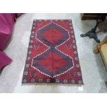 A Balochi rug. 1.33m x 0.82m