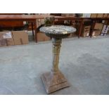 A birdbath. 31' high