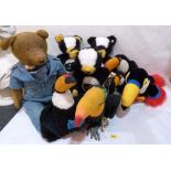 A collection of Guinness themed soft toys, the lot to include an early 20th century teddy bear