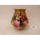 A Royal Doulton bulbous vase, gilded and painted with roses by E. Spilsbury. Signed. 4½' high