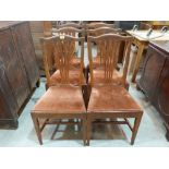 A set of six George III style oak dining chairs. Early 20th century