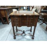 A Queen Anne style mahogany side table, the banded top over two drawers, on barleytwist legs with '