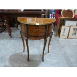 A French style burrwood veneered demi-lune pier table. 22½' wide