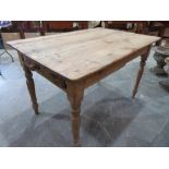 A Victorian pine kitchen table with frieze drawer. 47½' long