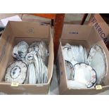 Two boxes of dinnerware