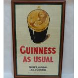 A framed Guinness print on textile, 'Guinness As Usual'. 30' x 18'
