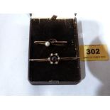Two 9ct bar brooches set with amethysts and pearls to the knife wires. 3.4g gross