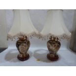 A pair of oriental style ceramic table lamps