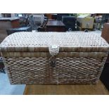 A wicker laundry basket