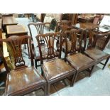 A set of six early 20th century mahogany dining chairs in George III style, with drop-in leather