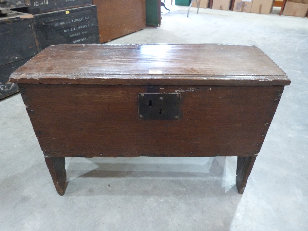 A 17th century six plank chest with chip carved lid. 33' wide