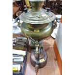 A brass samovar and a copper teapot