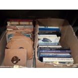 A box of books on English ceramics and a box of records