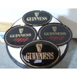Four Guinness ceramic oval plaques