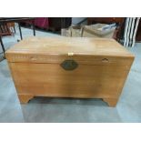 An Oriental camphorwood blanket chest. 40' wide