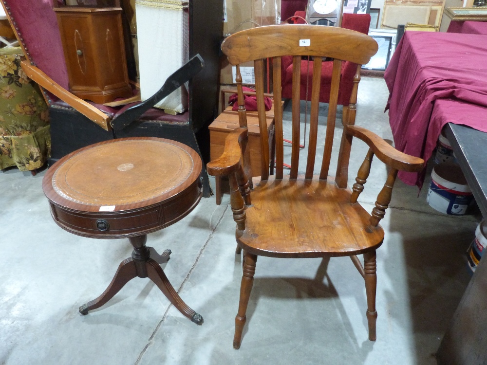 A lath back elbow chair and a drum occasional table