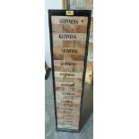 A Guinness wood block tower game in display case. 42' high