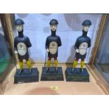Three iron figural Guinness moneyboxes. 14' high