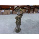 A garden statuary figure. 33' high