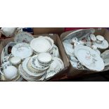 Two boxes of tea and dinnerware