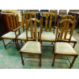 A set of six oak dining chairs on barleytwist legs, the set to include two carvers