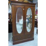 An Edward VII mahogany and inlaid wardrobe. 48' wide