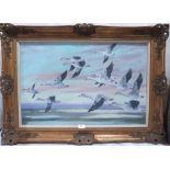 ATTRIB: JOHN W. GOUGH. BRITISH 20TH CENTURY Geese in flight. Oil on board 19' x 29'