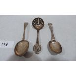 A silver sugar sifting spoon and two silver spoons. 2ozs 7dwts