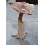 A naturalistic treen mushroom garden ornament. 32' high