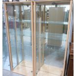 A pair of glazed display cabinets