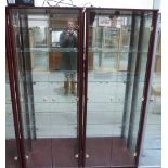 A pair of glazed display cabinets