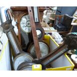 Three wall barometers, (all A.F.) and an oak wall clock