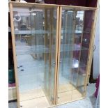 A pair of glazed display cabinets