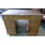 A Victorian pedestal kneehole desk with inlet top. 42' wide (Sun bleached)