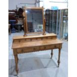 A late Victorian Arts and Crafts light oak dressing table. 48' wide