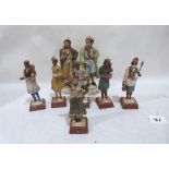 Eight Indian painted terracotta figures 4¾' x 7' high