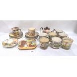 A collection of Royal Doulton Dickens Ware teaware, (Teapot cover chipped; one cup hairline cracked;